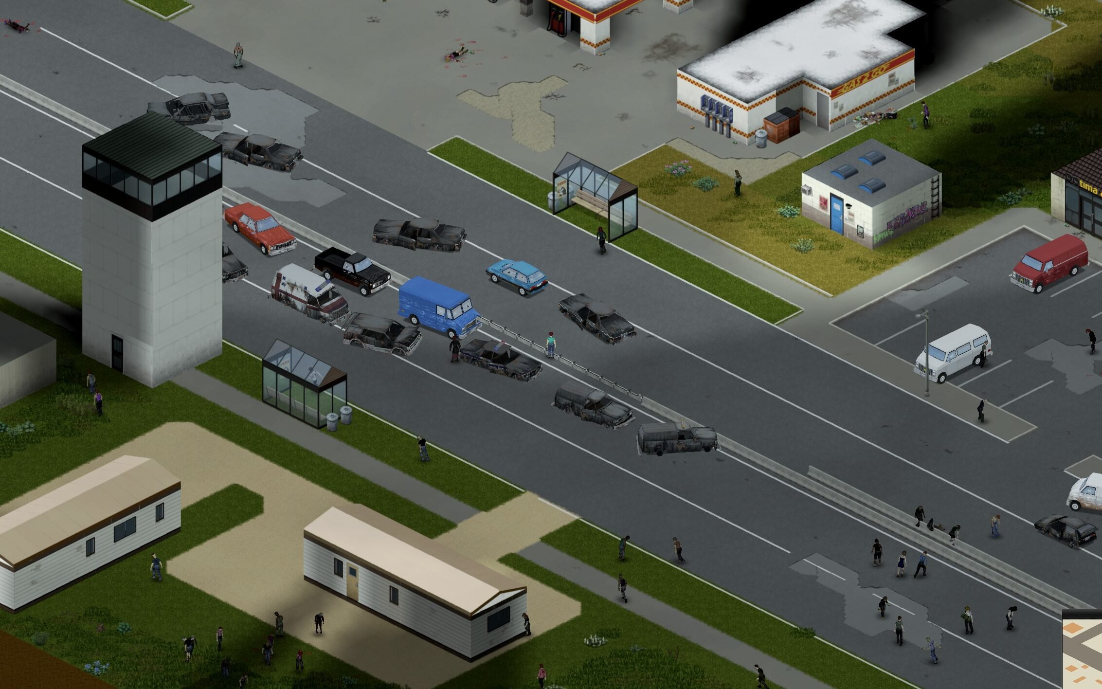 Pat Bren stands on a street filled with zombies and wrecked cars.