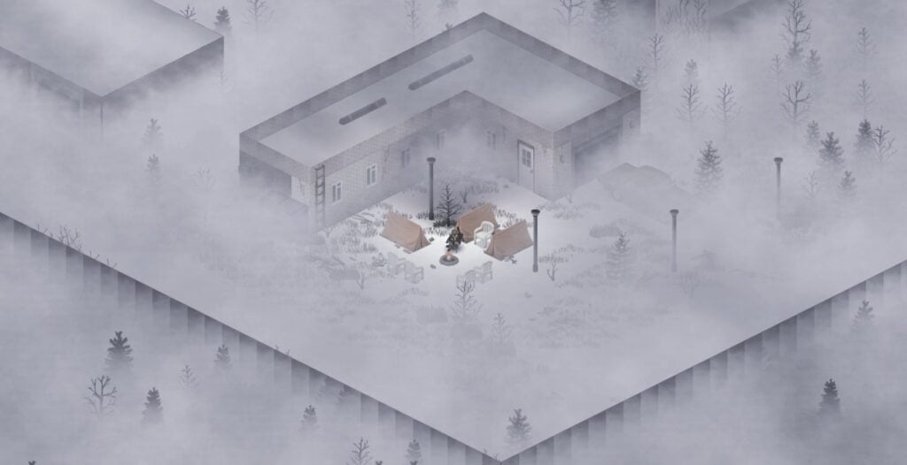A group of tents beside an l-shaped building, on a foggy day