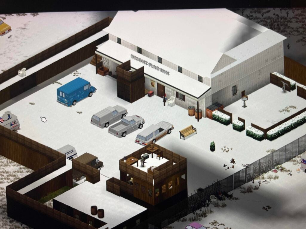 Rosewood's Bright Flag inn surrounded by wooden walls and covered in snow