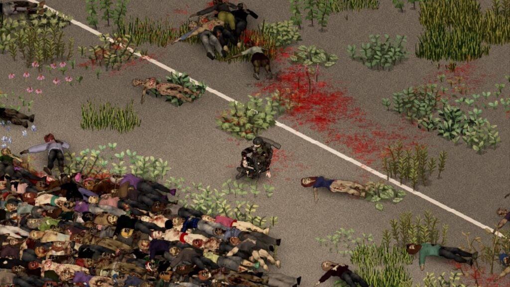 A player sitting on the ground near a large number of corpses, and some grass growths.