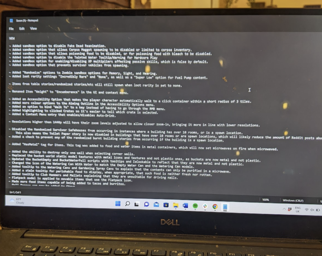 Picture of changelist on laptop. This is a reference to the at the time meme on the /r/projectzomboid subreddit of people taking photos of screens